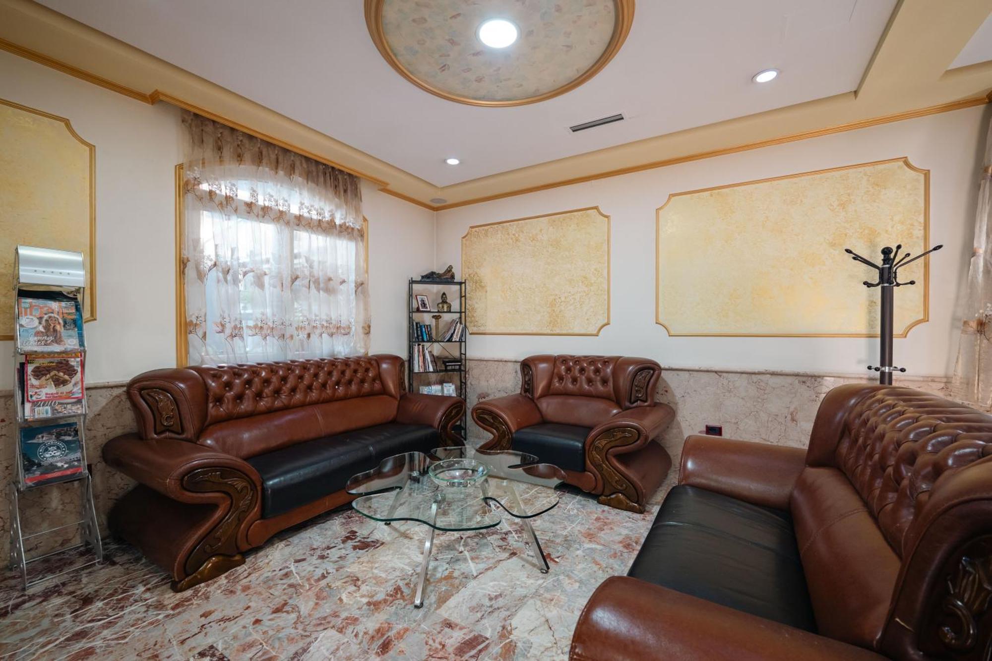 Olimpic Hotel Tirana Buitenkant foto