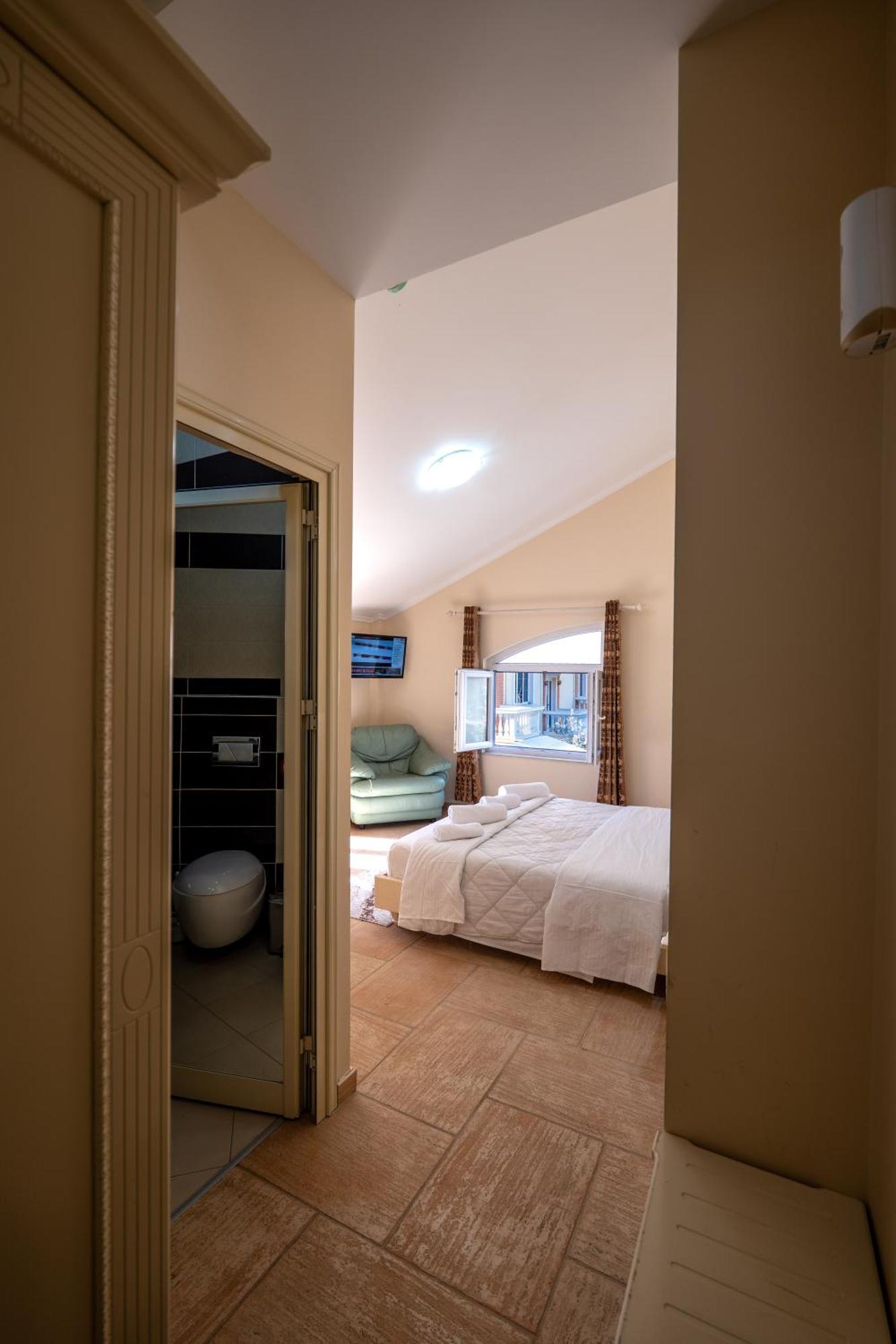 Olimpic Hotel Tirana Buitenkant foto